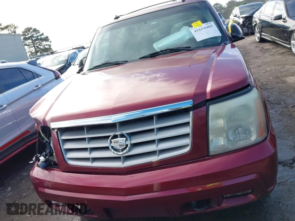 2003 Cadillac Escalade z VIN 1GYEC63T53R146068, wystawiony jako IAAI lot #41634405 z przebiegiem 272 263 mil mil oraz . Historia ofert i sprzedaży dostępna na DreamBid. Obrazek 12.
