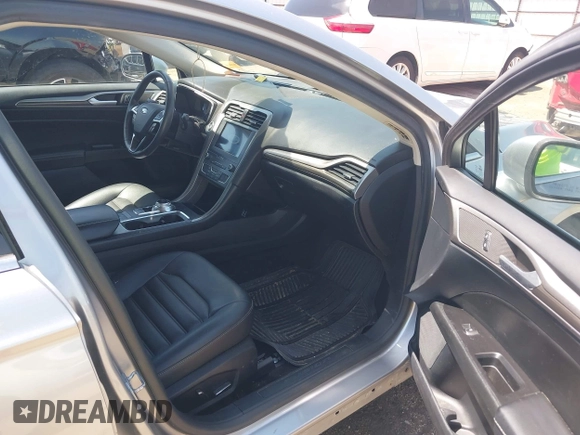 2020 Ford Fusion SEL with VIN 3FA6P0CDXLR196124, listed as a IAAI auction lot 42244231 with 99,306 mi miles and . Bid and sale history available at DreamBid. Image 5.