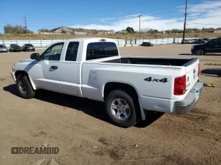 2006 Dodge Dakota SLT with VIN 1D7HW42K86S609668, listed as a Copart auction lot 80587354 with 238,688 mi miles and Salvage Title. Bid and sale history available at carsss.com. Image 2.