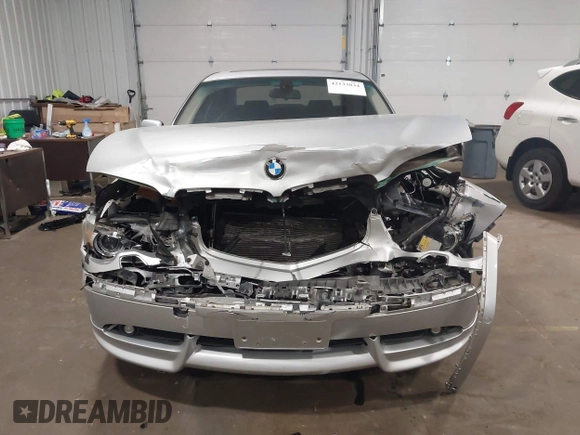 2004 BMW 7 Series 745Li with VIN WBAGN63594DS55672, listed as a IAAI auction lot 42133834 with 119,912 mi miles and . Bid and sale history available at carsss.com. Image 12.