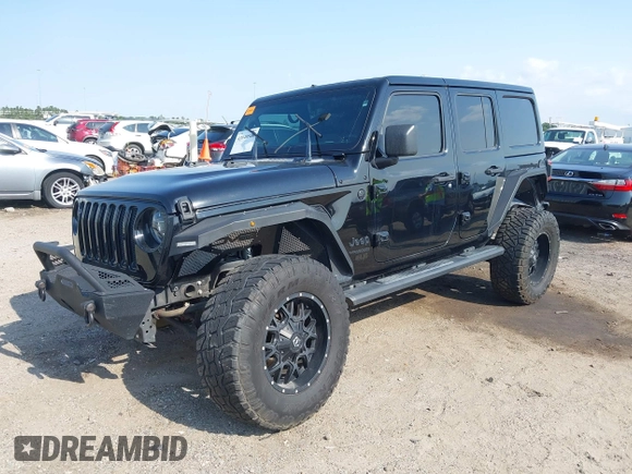 2020 Jeep Wrangler Unlimited Sahara with VIN 1C4HJXEG6LW211932, listed as a IAAI auction lot 42040546 with 74,732 mi miles and . Bid and sale history available at DreamBid. Image 21.