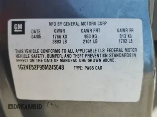 2005 Pontiac Grand Am SE with VIN 1G2NE52F95M245048, listed as a Copart auction lot 73114664 with 97,264 mi miles and Salvage Title. Bid and sale history available at carsss.com. Image 12.