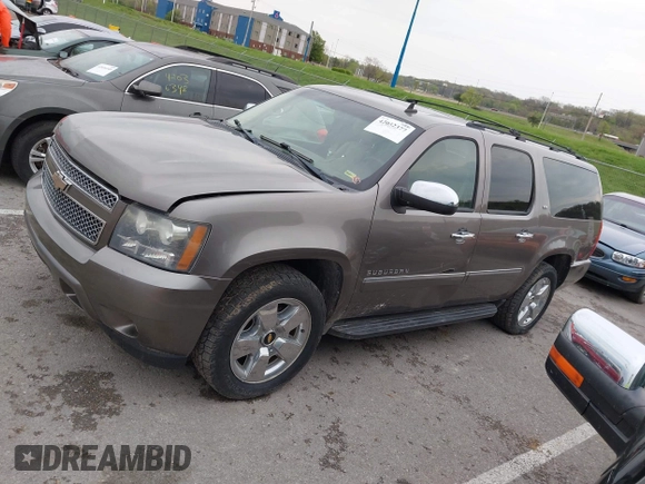 2011 Chevrolet Suburban LTZ with VIN 1GNSKKE32BR197356, listed as a IAAI auction lot 42052377 with 248,574 mi miles and . Bid and sale history available at DreamBid. Image 14.