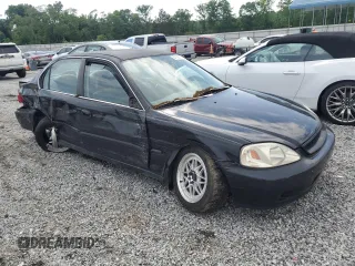 2000 Honda Civic LX z VIN 1HGEJ6670YL054677, wystawiony jako Copart lot #57126335 z przebiegiem 155 471 mil mil oraz Szkoda całkowita • Salvage title. Historia ofert i sprzedaży dostępna na DreamBid. Obrazek 4.
