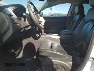 2016 Cadillac SRX Performance Collection with VIN 3GYFNCE38GS576027, listed as a Copart auction lot 52863115 with 85,615 mi miles and Salvage title. Bid and sale history available at DreamBid. Image 7.