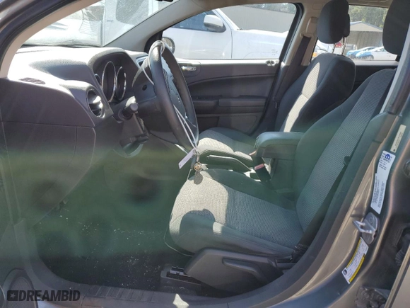 2011 Dodge Caliber Mainstreet with VIN 1B3CB3HA7BD296881, listed as a Copart auction lot 46795065 with 67,583 mi miles and Salvage Title. Bid and sale history available at carsss.com. Image 7.