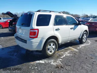2010 Ford Escape XLT with VIN 1FMCU0D72AKC62810, listed as a IAAI auction lot 41343848 with 227,622 mi miles. Bid and sale history available at carsss.com. Image 4.