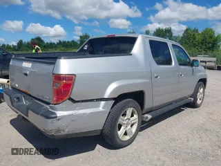 2013 Honda Ridgeline RTL with VIN 5FPYK1F51DB007236, listed as a IAAI auction lot 42762126 with 201,758 mi miles and . Bid and sale history available at DreamBid. Image 4.