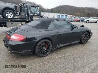 2004 Porsche 911 Carrera with VIN WP0CA29974S653278, listed as a Copart auction lot 81827464 with 97,273 mi miles and Salvage Title. Bid and sale history available at carsss.com. Image 3.