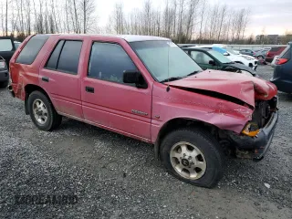 1996 Honda Passport z VIN 4S6CM58V3T4400052, wystawiony jako Copart lot #41616755 z przebiegiem 134 910 mil mil oraz Szkody całkowita. Historia ofert i sprzedaży dostępna na DreamBid. Obrazek 4.