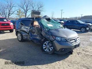 2014 Honda CR-V EX with VIN 2HKRM4H52EH609104, listed as a IAAI auction lot 41879419 with 1 mi miles. Bid and sale history available at carsss.com. Image 1.