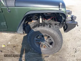 2007 Jeep Wrangler Unlimited X с VIN 1J4GA39197L115109, выставлен на аукционе IAAI как лот 42582190 с пробегом 141 080 миль миль и . История ставок и продаж доступна на DreamBid. Изображение 6.