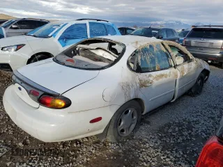 1997 Ford Taurus GL z VIN 1FALP52U1VG253340, wystawiony jako Copart lot #44081395 z przebiegiem 210 117 mil mil oraz Szkoda całkowita • Salvage title. Historia ofert i sprzedaży dostępna na DreamBid. Obrazek 3.