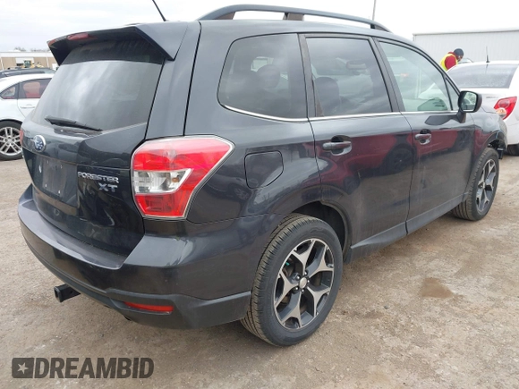 2015 Subaru Forester 2.0XT Premium with VIN JF2SJGDC1FH823888, listed as a IAAI auction lot 41829859 with 90,743 mi miles. Bid and sale history available at carsss.com. Image 4.