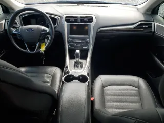 2016 Ford Fusion SE Hybrid with VIN 3FA6P0LU9GR374840, listed as a Copart auction lot 56190995 with 154,540 mi miles and Salvage title. Bid and sale history available at DreamBid. Image 8.