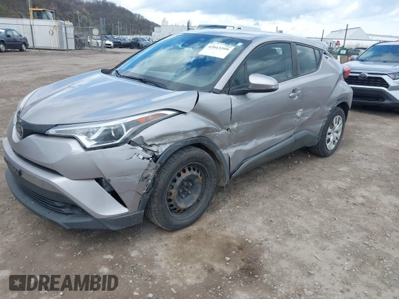 2019 Toyota C-HR XLE with VIN NMTKHMBX7KR079751, listed as a IAAI auction lot 42013399 with 74,665 mi miles. Bid and sale history available at carsss.com. Image 6.