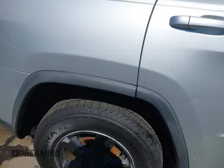 2011 Jeep Grand Cherokee Laredo with VIN 1J4RS4GGXBC513523, listed as a IAAI auction lot 42203802 with 242,239 mi miles and . Bid and sale history available at DreamBid. Image 6.
