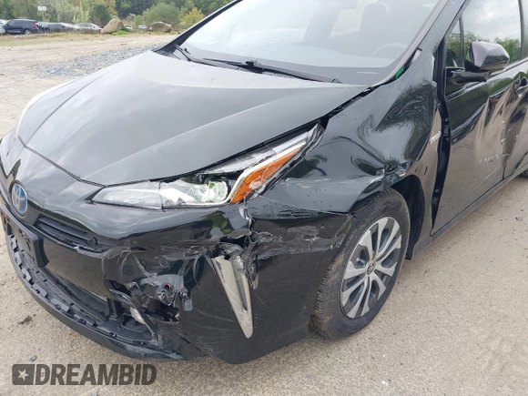 2020 Toyota Prius LE with VIN JTDL9RFU8L3014930, listed as a IAAI auction lot 42171038 with 67,785 mi miles and . Bid and sale history available at DreamBid. Image 6.