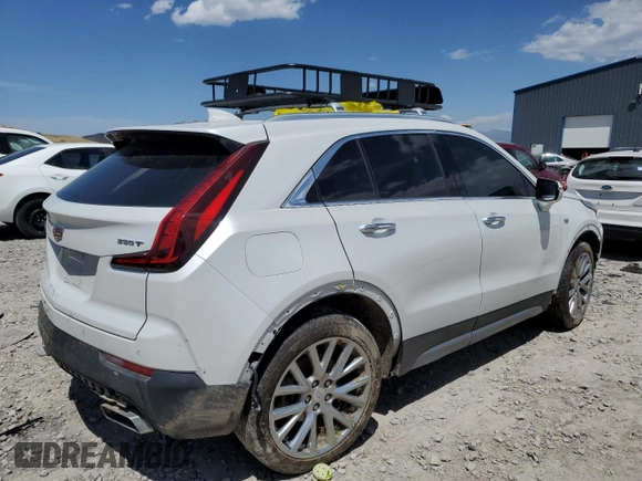 2023 Cadillac XT4 AWD Premium Luxury with VIN 1GYFZDR46PF130198, listed as a Copart auction lot 57763285 with 8,346 mi miles and Salvage title. Bid and sale history available at DreamBid. Image 3.