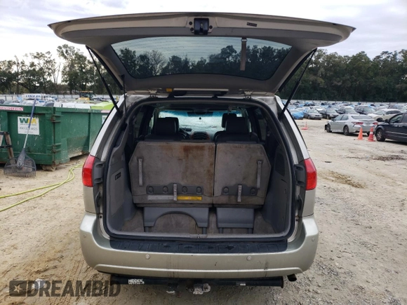 2009 Toyota Sienna XLE with VIN 5TDBK22C89S027706, listed as a Copart auction lot 88672015 with 215,515 mi miles and Salvage Title. Bid and sale history available at DreamBid. Image 6.