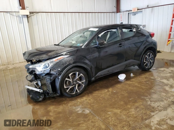 2018 Toyota C-HR XLE z VIN NMTKHMBX0JR041387, wystawiony jako Copart lot #57050385 z przebiegiem Nie podano mil oraz Szkody całkowita. Historia ofert i sprzedaży dostępna na DreamBid. Obrazek 1.
