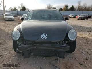 2012 Volkswagen Beetle 2.5L w/Sound/Nav PZEV with VIN 3VWJP7AT5CM617460, listed as a Copart auction lot 84972374 with 144,080 mi miles and Salvage Title. Bid and sale history available at carsss.com. Image 5.