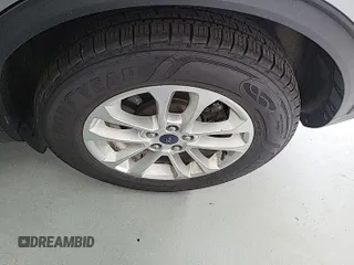 2022 Ford Escape SE with VIN 1FMCU0G67NUB80990, listed as a IAAI auction lot 42858836 with 94,635 mi miles and . Bid and sale history available at DreamBid. Image 3.