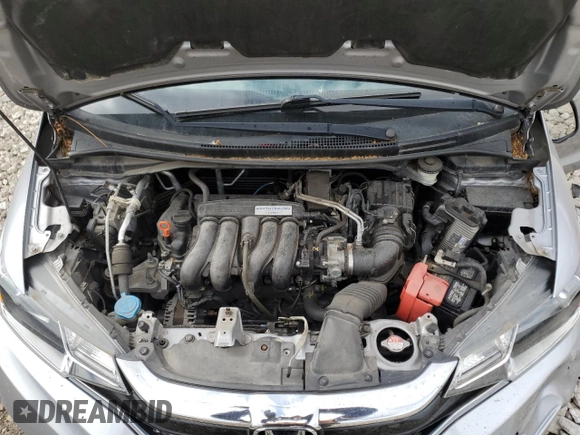 2019 Honda Fit LX z VIN 3HGGK5H47KM722595, wystawiony jako Copart lot #56819975 z przebiegiem 31 371 mil mil oraz Szkoda całkowita • Salvage title. Historia ofert i sprzedaży dostępna na DreamBid. Obrazek 11.
