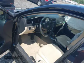 2014 Volkswagen Jetta SE with VIN 3VWD17AJ4EM429576, listed as a IAAI auction lot 42542604 with 142,313 mi miles and . Bid and sale history available at DreamBid. Image 5.