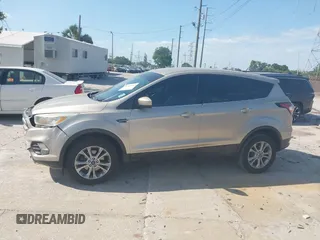 2017 Ford Escape SE z VIN 1FMCU0GD8HUC60074, wystawiony jako IAAI lot #41918443 z przebiegiem 85 787 mil mil oraz . Historia ofert i sprzedaży dostępna na DreamBid. Obrazek 15.