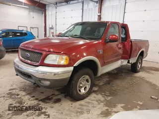 2003 Ford F-150 XL with VIN 1FTRX18L33NB82694, listed as a IAAI auction lot 41612431 with 179,664 mi miles. Bid and sale history available at carsss.com. Image 17.