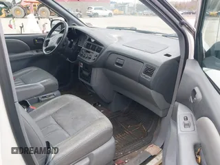 2000 Toyota Sienna LE with VIN 4T3ZF13C4YU233128, listed as a IAAI auction lot 41973322 with 117,577 mi miles. Bid and sale history available at carsss.com. Image 5.