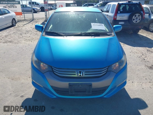 2010 Honda Insight EX with VIN JHMZE2H74AS013148, listed as a IAAI auction lot 42194894 with 114,885 mi miles and . Bid and sale history available at DreamBid. Image 16.
