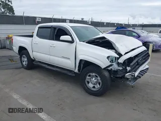 2021 Toyota Tacoma SR z VIN 3TYAX5GN2MT014259, wystawiony jako IAAI lot #41949474 z przebiegiem 46 959 mil mil oraz . Historia ofert i sprzedaży dostępna na DreamBid. Obrazek 1.