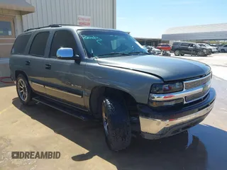 2001 Chevrolet Tahoe LS z VIN 1GNEC13T51R207402, wystawiony jako IAAI lot #41799893 z przebiegiem 141 977 mil mil oraz . Historia ofert i sprzedaży dostępna na DreamBid. Obrazek 1.