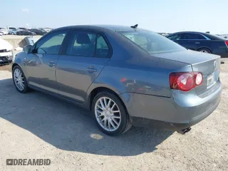 2008 Volkswagen Jetta Sedan Wolfsburg with VIN 3VWRJ71K98M196183, listed as a IAAI auction lot 41512701 with 95,231 mi miles. Bid and sale history available at carsss.com. Image 3.