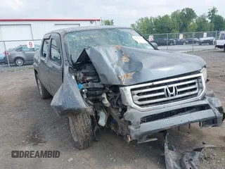 2013 Honda Ridgeline RTL with VIN 5FPYK1F56DB004834, listed as a IAAI auction lot 42706361 with 230,000 mi miles and . Bid and sale history available at DreamBid. Image 6.