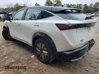 2023 Nissan ARIYA Premiere z VIN JN1BF0BA1PM402497, wystawiony jako Copart lot #77119343 z przebiegiem 7609 mil mil oraz . Historia ofert i sprzedaży dostępna na DreamBid. Obrazek 2.