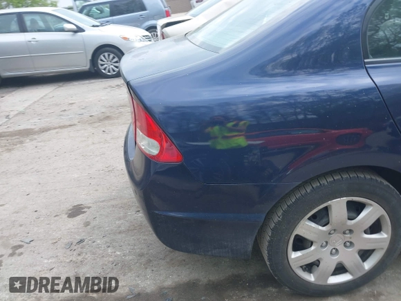2010 Honda Civic LX with VIN 2HGFA1F52AH570385, listed as a IAAI auction lot 42234739 with 199,201 mi miles and . Bid and sale history available at DreamBid. Image 16.