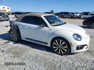 2015 Volkswagen Beetle with VIN 3VW7S7AT1FM818382, listed as a Copart auction lot 41666205 with 47,429 mi miles and Salvage Title. Bid and sale history available at DreamBid. Image 4.