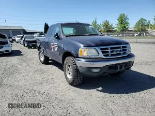 2000 Ford F-150 XL z VIN 1FTRX18L5YNA10836, wystawiony jako Copart lot #55325245 z przebiegiem 188 237 mil mil oraz Szkoda całkowita • Salvage title. Historia ofert i sprzedaży dostępna na DreamBid. Obrazek 13.