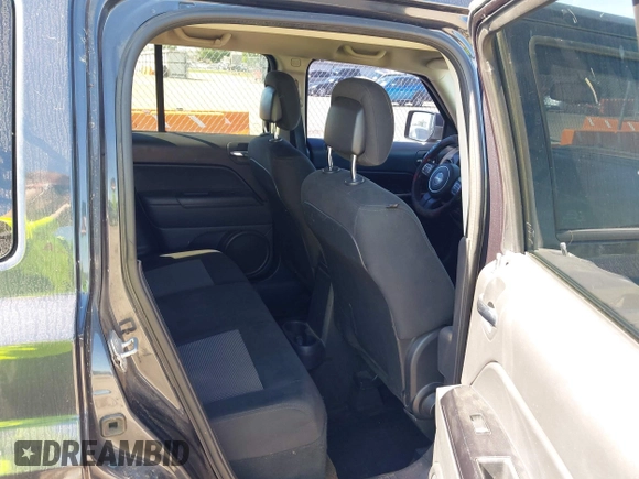 2014 Jeep Patriot Latitude with VIN 1C4NJPFB5ED624378, listed as a IAAI auction lot 42195410 with 234,059 mi miles and . Bid and sale history available at carsss.com. Image 8.
