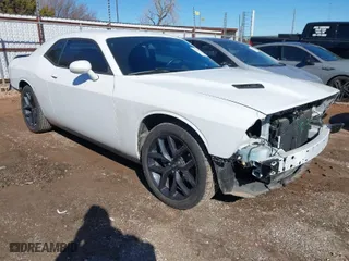 2021 Dodge Challenger SXT with VIN 2C3CDZAG1MH560522, listed as a IAAI auction lot 41709759 with 32,384 mi miles. Bid and sale history available at carsss.com. Image 1.