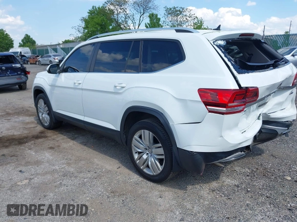 2019 Volkswagen Atlas SE z VIN 1V2UR2CAXKC539779, wystawiony jako IAAI lot #42188614 z przebiegiem 49 994 mil mil oraz . Historia ofert i sprzedaży dostępna na DreamBid. Obrazek 3.