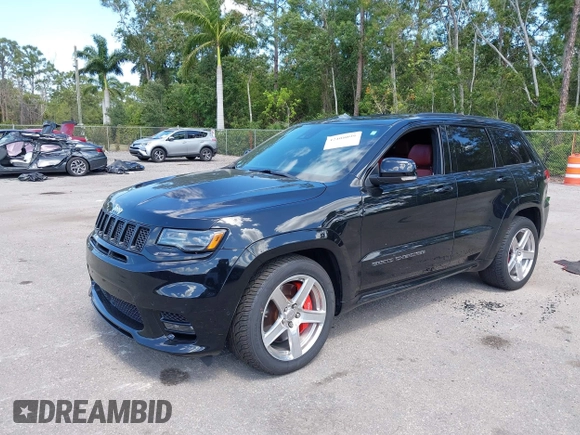 2017 Jeep Grand Cherokee SRT z VIN 1C4RJFDJ8HC653924, wystawiony jako IAAI lot #42108099 z przebiegiem 61 560 mil mil oraz . Historia ofert i sprzedaży dostępna na DreamBid. Obrazek 2.