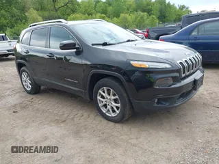 2014 Jeep Cherokee Latitude z VIN 1C4PJMCB6EW273352, wystawiony jako IAAI lot #42244232 z przebiegiem 187 294 mil mil oraz . Historia ofert i sprzedaży dostępna na DreamBid. Obrazek 1.