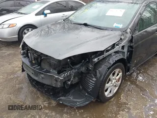 2010 Mazda 3 i SV with VIN JM1BL1SF7A1343584, listed as a IAAI auction lot 41649578 with 69,226 mi miles and . Bid and sale history available at DreamBid. Image 6.