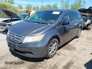 2011 Honda Odyssey EX-L with VIN 5FNRL5H62BB071404, listed as a IAAI auction lot 42196826 with 278,657 mi miles and . Bid and sale history available at carsss.com. Image 2.