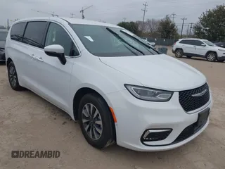 2023 Chrysler Pacifica Hybrid Touring L with VIN 2C4RC1L7XPR588776, listed as a IAAI auction lot 41344136 with 47,165 mi miles and . Bid and sale history available at DreamBid. Image 1.