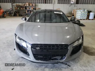 2009 Audi R8 4.2L z VIN WUAAU34279N002238, wystawiony jako Copart lot #74154804 z przebiegiem 71 425 mil mil oraz Szkoda całkowita • Salvage title. Historia ofert i sprzedaży dostępna na DreamBid. Obrazek 5.